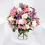 Purple and White Floral Bunch In Glass Vase