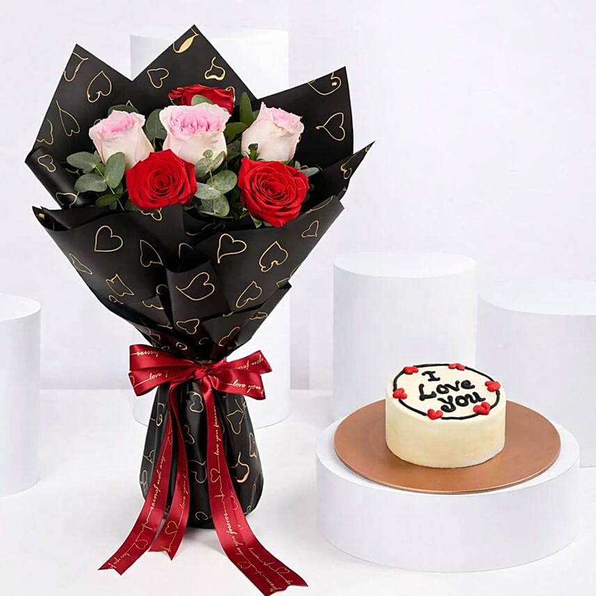 Crimson Rose Bouquet and Heart Cake Combo: Gifts to Manama