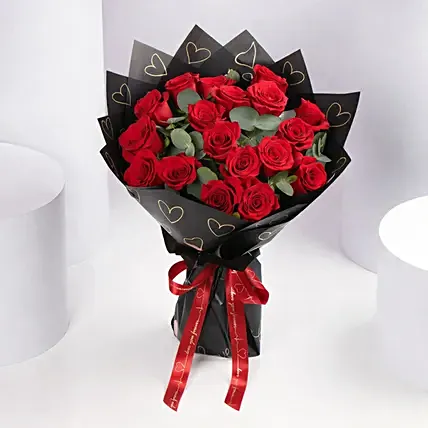 Valentines 18 Red Roses Bouquet in Black Wrap: Gifts to Manama