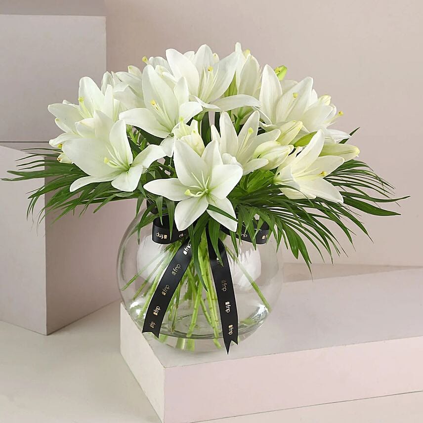 Pure 10 White Asiatic Lilies In Fishbowl Vase: Gift Delivery to India