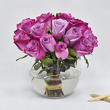 Purple Roses In Glass Bowl: 