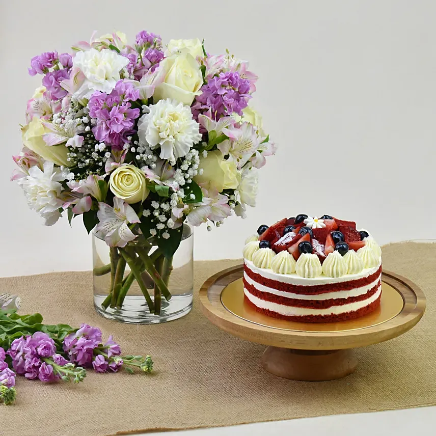 1 Kg Red Velvet Cake With Pink Floral Arrangement: Purple Flower Bouquets