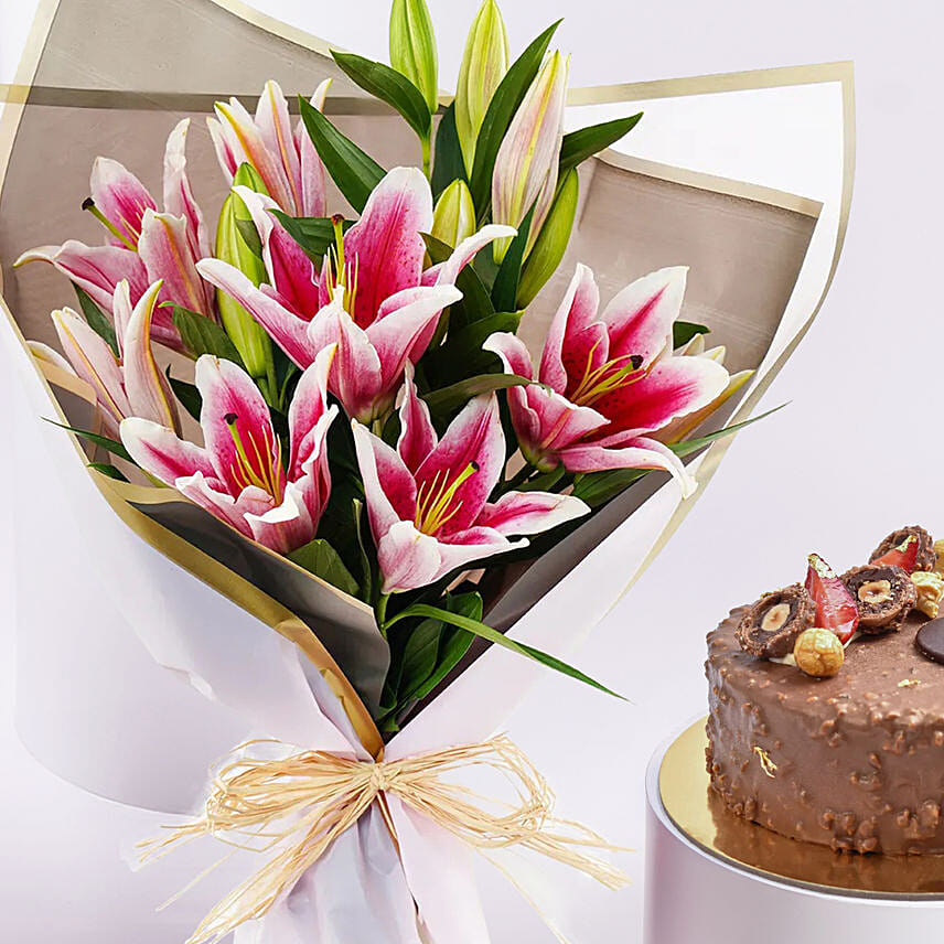 Order Pink Lilies Elegance Bouquet With Rocher Cake Online | Same-Day ...