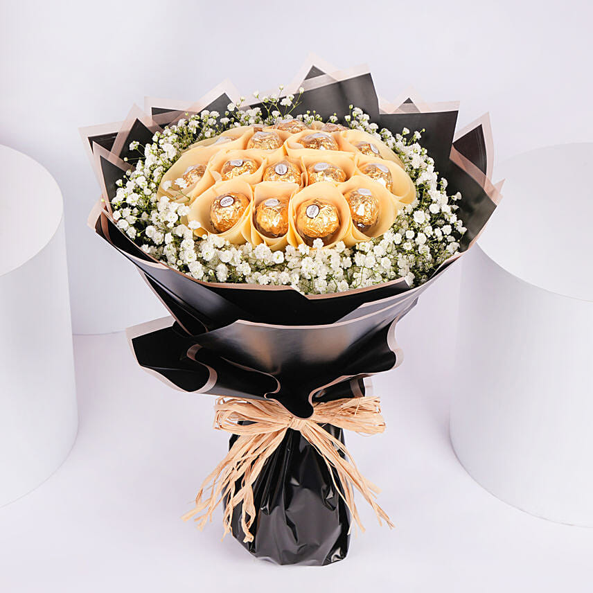 باقة مبهجة من شوكلاتة فيريرو روشيه وورد الجبسوفيليا : هدايا شوكولاتة فيريرو روشيه 