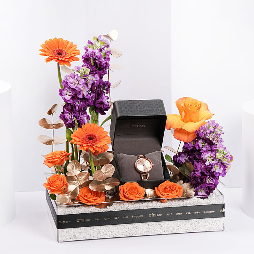 تيتان | ساعة يد نسائية راغا روزقولد مع باقة ورد : هدايا ساعات يد 