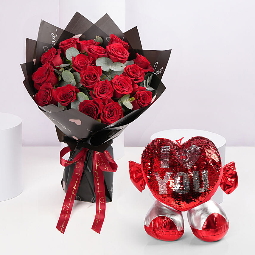ورود حمراء مع دبدوب وبالون قلب: باقة ورد و تيدي بير اونلاين 