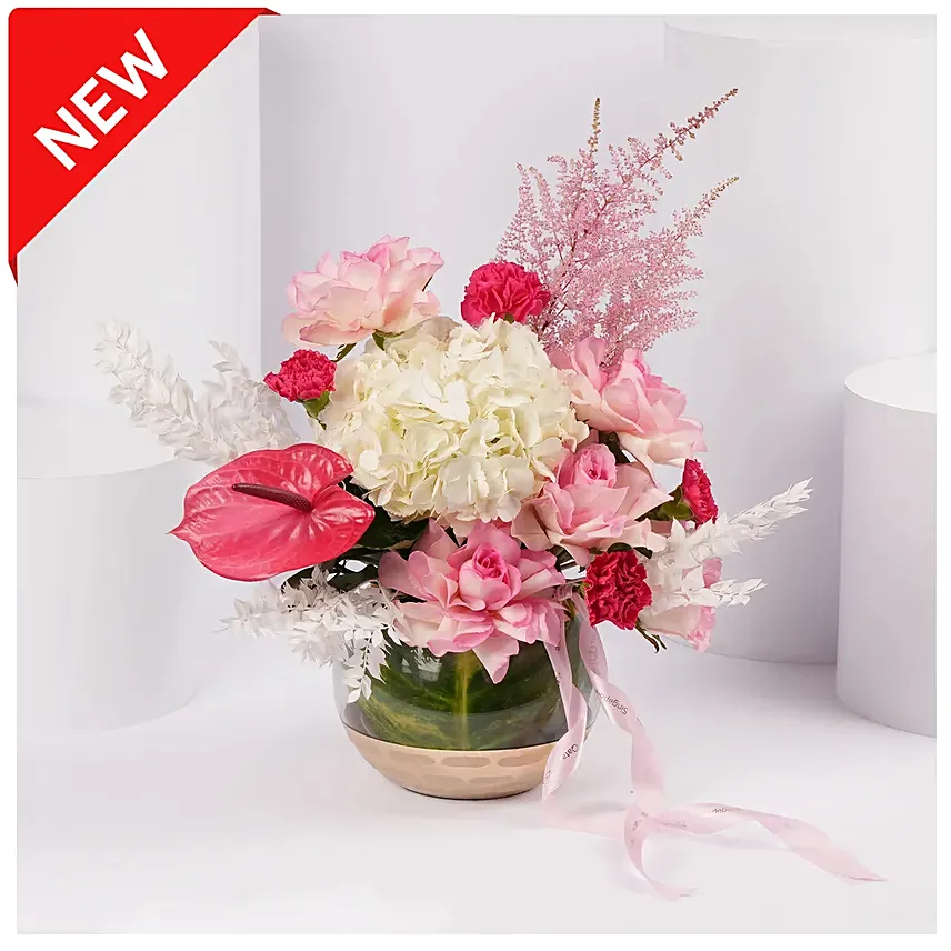 Blushing Blossom Arrangement in Glass Vase: 