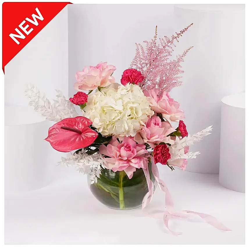 Blushing Blossom Arrangement in Glass Vase: 