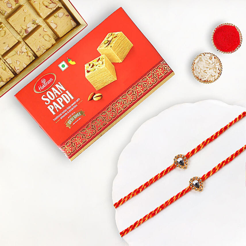 Sacred Mauli Rakhi Set Of 2 With Soan Papdi: Mauli Rakhi 