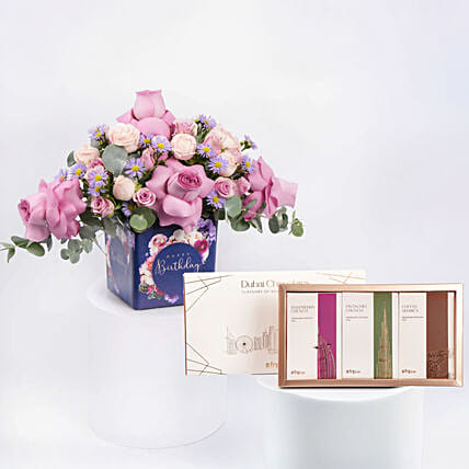 كومبو مزهرية عيد الميلاد مع بوكس شوكولاتة دبي: بكج هدايا شوكولاتة اونلاين