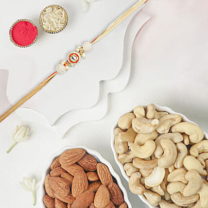 Crimson Majestic Pearl Rakhi With Almonds and Cashew: Rakhi With Dryfruits