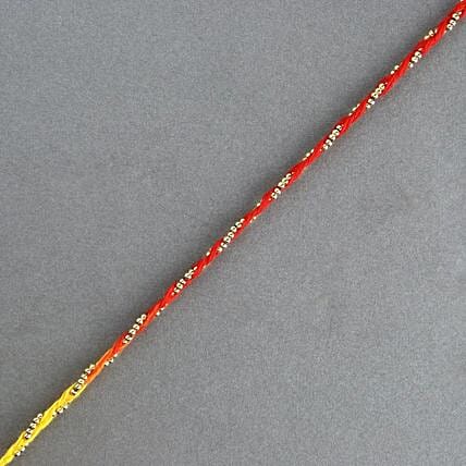 Sacred Bead Work Mauli Rakhi And 16 Pcs Ferrero Rocher: Rakhi With Chocolates