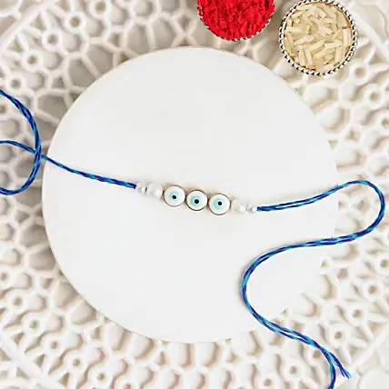 Simplistic Blue Evil Eye Rakhi: Fancy Rakhi 