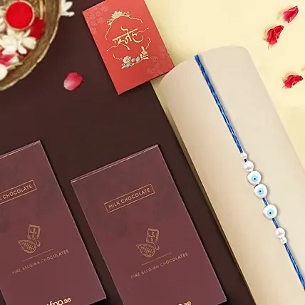 Simplistic Blue Evil Eye Rakhi N Milk Chocolates: Rakhi With Chocolates 