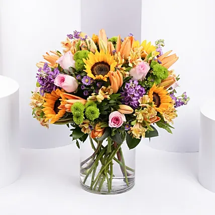 Vibrant Bunch of Flowers In Glass Vase: Mixed Flower Bouquets