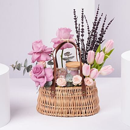 Elegant Pink Tulips And Purple Roses Basket Arrangement: Women's Day Flowers