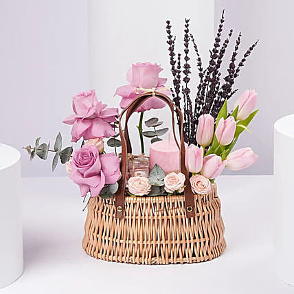 Elegant Pink Tulips And Purple Roses Basket Arrangement: Women's Day Flowers