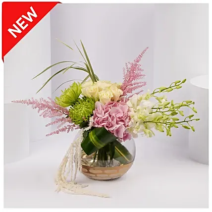 Serene Bloom Arrangement in Glass Vase: Flowers Shop Dubai