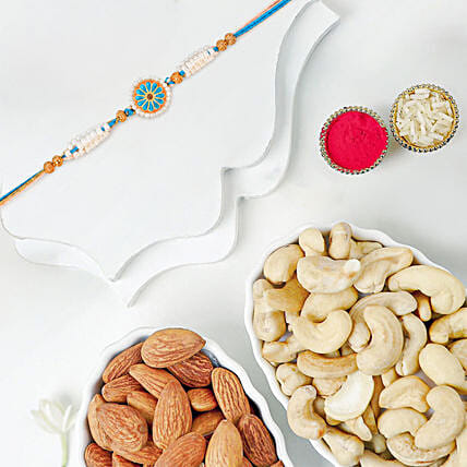 Ethnic Treasure Rakhi With Cashews And Almonds: Rakhi With Dryfruits