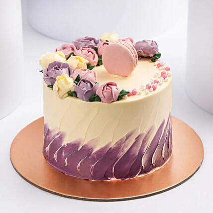 Flowers And Macaroons Chocolate Cake: Send Gifts to Oman