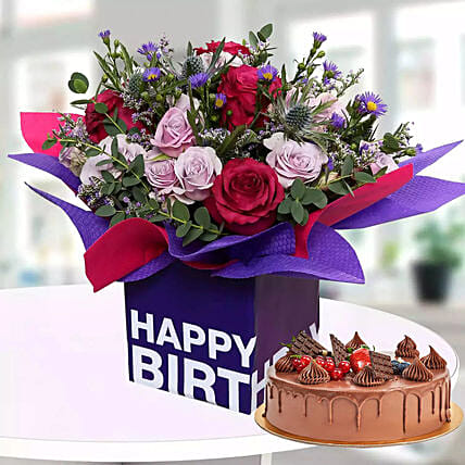 1 Kg Chocolate Cake With Birthday Flower Arrangement: Send Birthday Cakes To Qatar