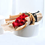 باقة 12 وردة حمراء مع جيبسوفيلا - باقة الرومانسية