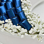 Chocolates & Flowers Crescent Arranegement