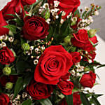 Fresh Red Roses in a Vase
