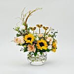 Mix Flowers in Fish Bowl with Candle Holder