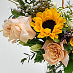 Mix Flowers in Fish Bowl with Candle Holder