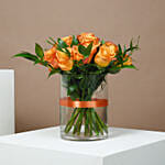 Orange Roses in Glass Vase