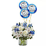 Blue and White Flower Arrangement With Balloons