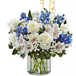 Blue and White Flower Arrangement With Balloons