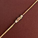 Crimson Majestic Pearl Rakhi N Soan Papdi