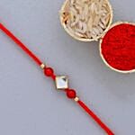 Designer Round Rakhi And 3 Pcs Ferrero Rocher
