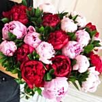 باقة ورود فاوانيا حمراء ووردية