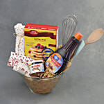 أدوات خبز وتحضير كيك كاملة في وعاء زجاجي مثل بيتي كروكر