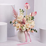 Pink and White Flower Arrangement in White Ceramic Vase
