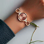 Titan Raga Rose Gold Dial Watch for Her Elegant Gift in a Glass Vase With Flowers