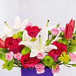 Tulips Roses and Carnations in Glass Vase