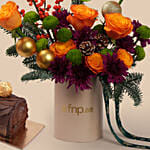 Christmas Yule Log Cake and Festive Flower Arrangement