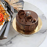 ورد وكيك - كيك الشوكولاته مع باقة ورد برتقالي