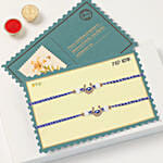 Protective Evil Eye Rakhi Duo With Kaju Katli
