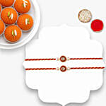 Classic Pearl Rakhi Set Of 2 With Motichoor Laddoo