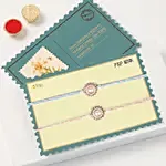 Pearl Floral Rakhi Set Of 2 With Half Kg Chocolate Cake