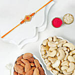 Orange Floral Beads Rakhi With Cashews And Almonds