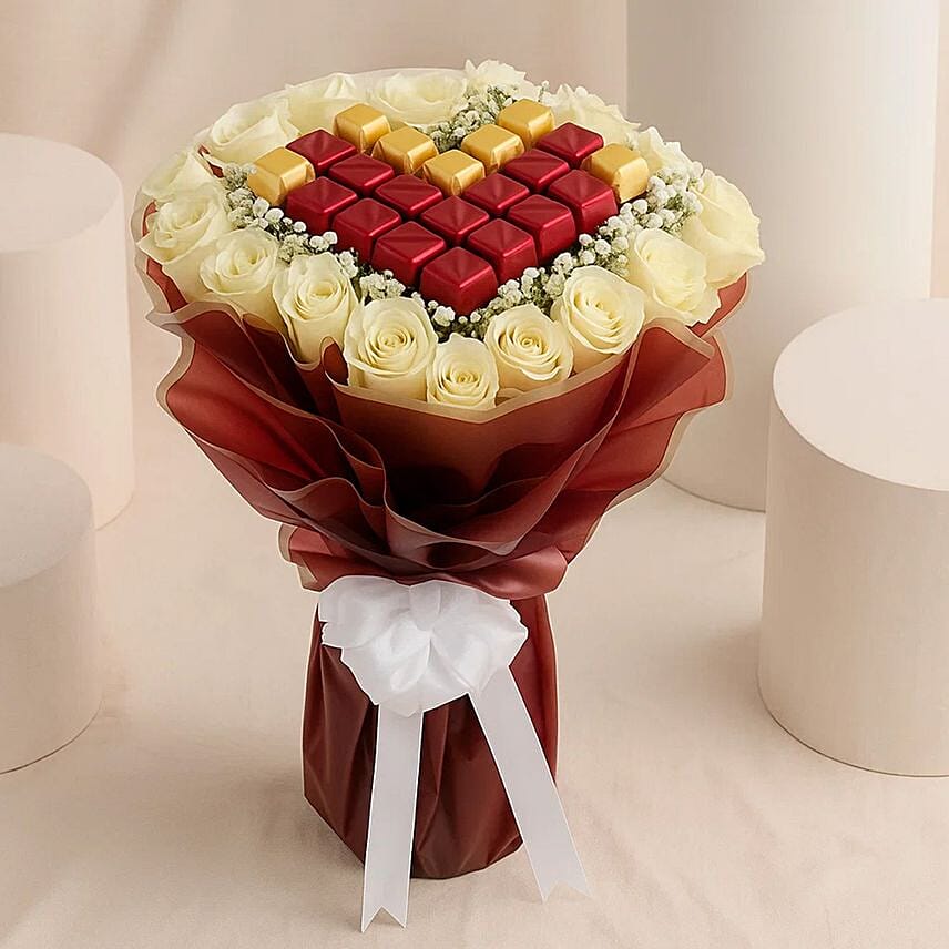 Dalal White Roses N Chocolates Bouquet: Send Anniversary Gifts to Saudi Arabia