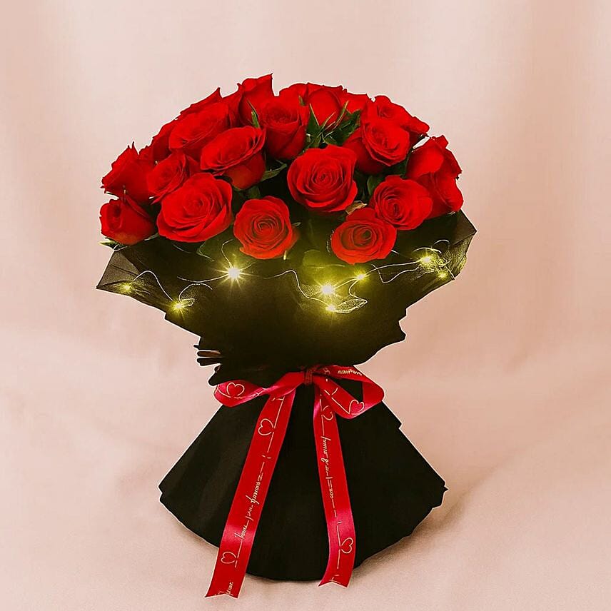 Red Rose Elegance Led Wrapping Bouquet: Send Anniversary Gifts to Saudi Arabia