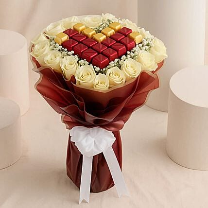 Dalal White Roses N Chocolates Bouquet: Send Anniversary Gifts to Saudi Arabia