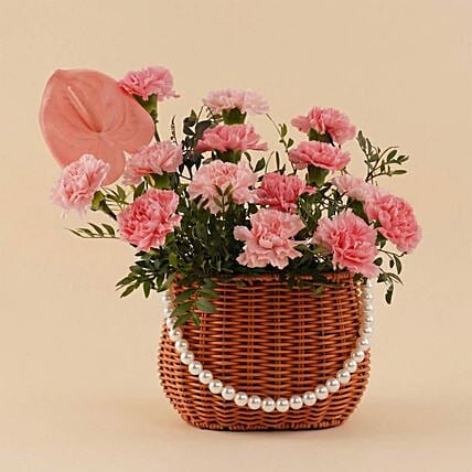 Delicate Pink Carnation Basket: Send Gifts to Saudi Arabia